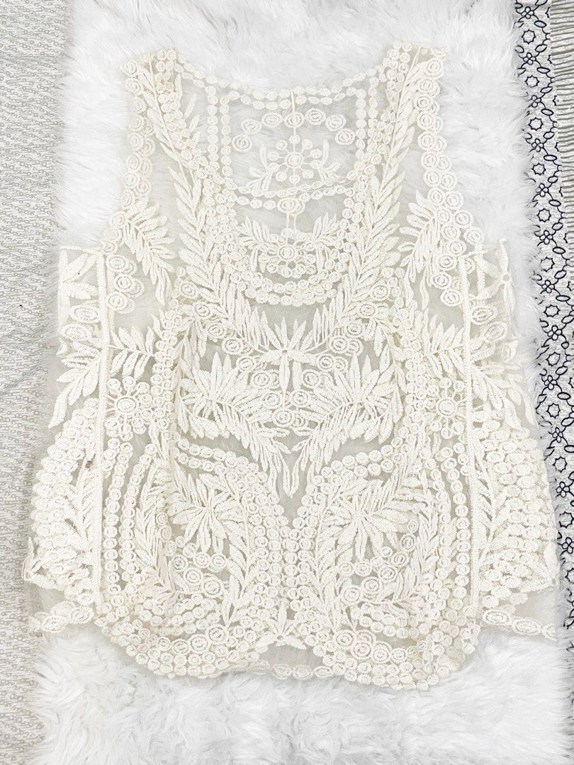 Preloved see-through top (Category: Sleeveless) located in San Juan City. Submitted by vogueconsignmentph (Listing ID 1206359911, Image 1). Description: Fits up to Medium frame. .