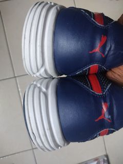 Puma brand shoes well used