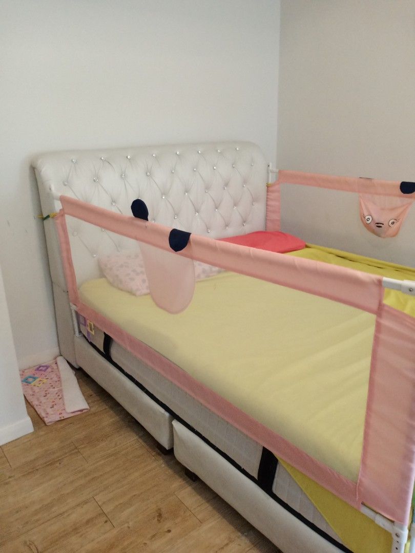 Queen bed frame with NeckPro 12 inch mattress and kid safety gates