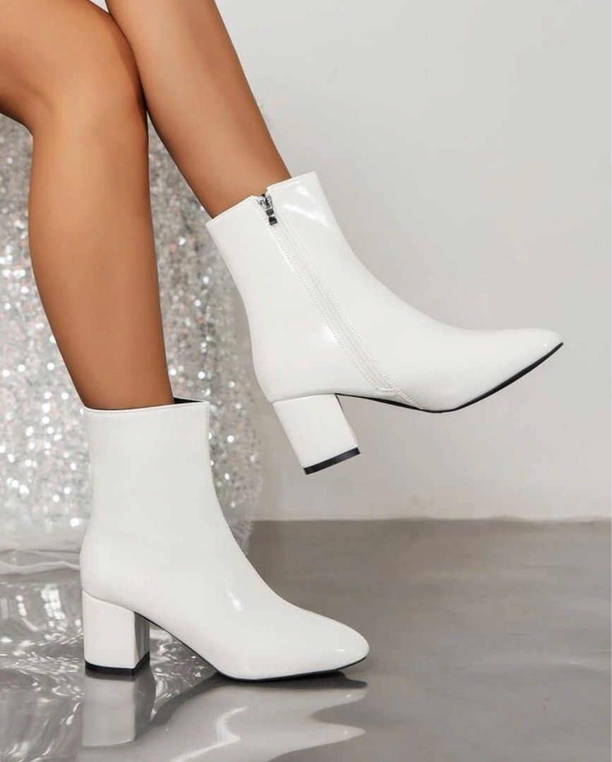 White ankle clearance boots black heel