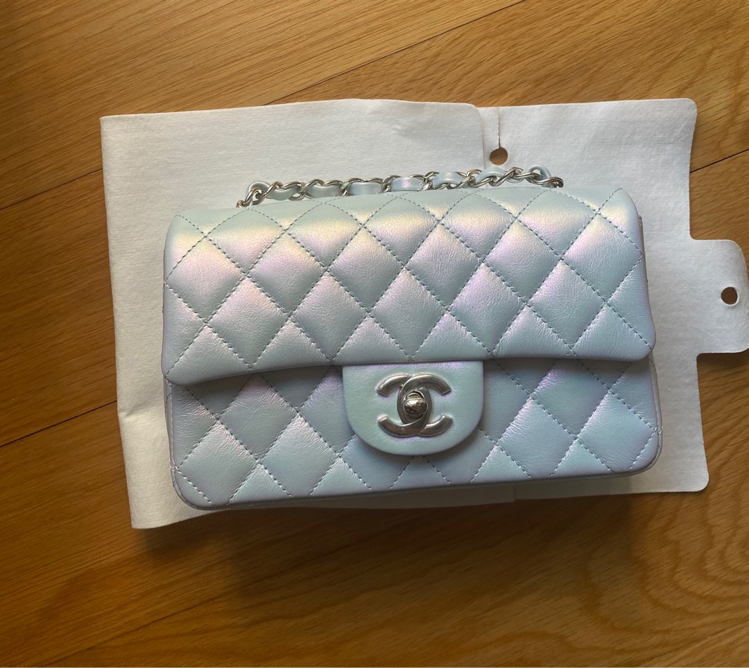 Authentic and brand new Chanel mini flap bag in iridescent icy blue