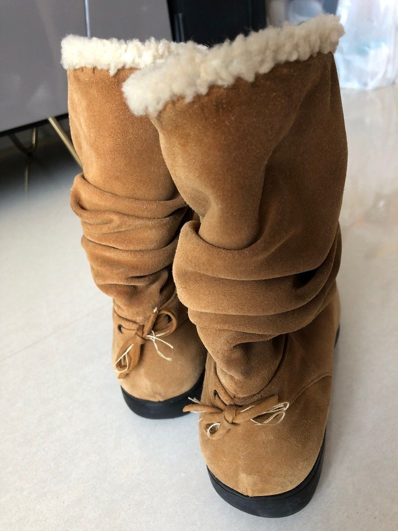 Cute fuzzy boots Stuart Weitzman