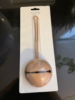 Mushie pacifier holder