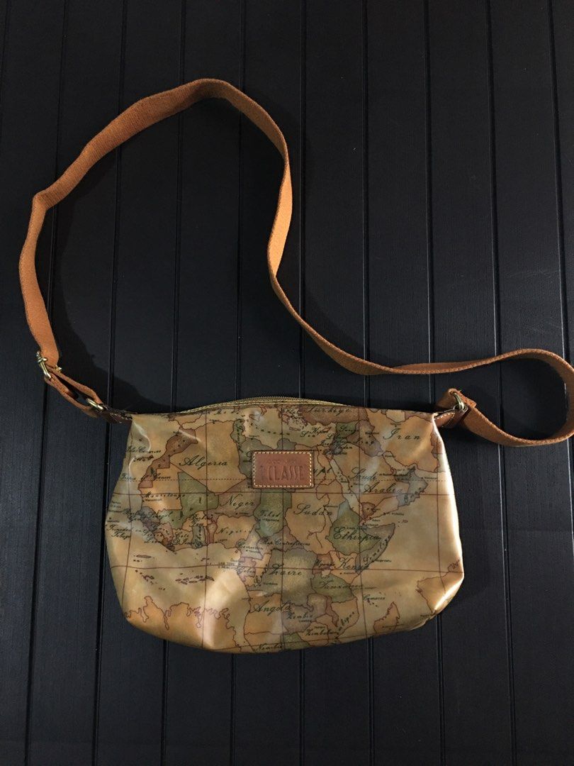 Alviero Martini (Category: Luxury Bags & Wallets) located in Caloocan City. Submitted by thrift.crcl (Listing ID 1200802555, Image 1). Description: Alviero Martini Sling bag 2500 Check last picture minimal stain.