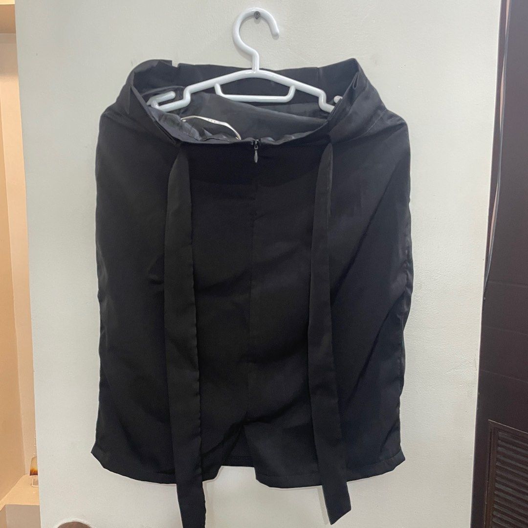 Black pencil skirt (Category: Skirts) located in Pasig City. Submitted by ___k8 (Listing ID 1200838947, Image 2). Description: Only used once for an interview! HQ material 🤍 With a cute ribbon tie at the waist.