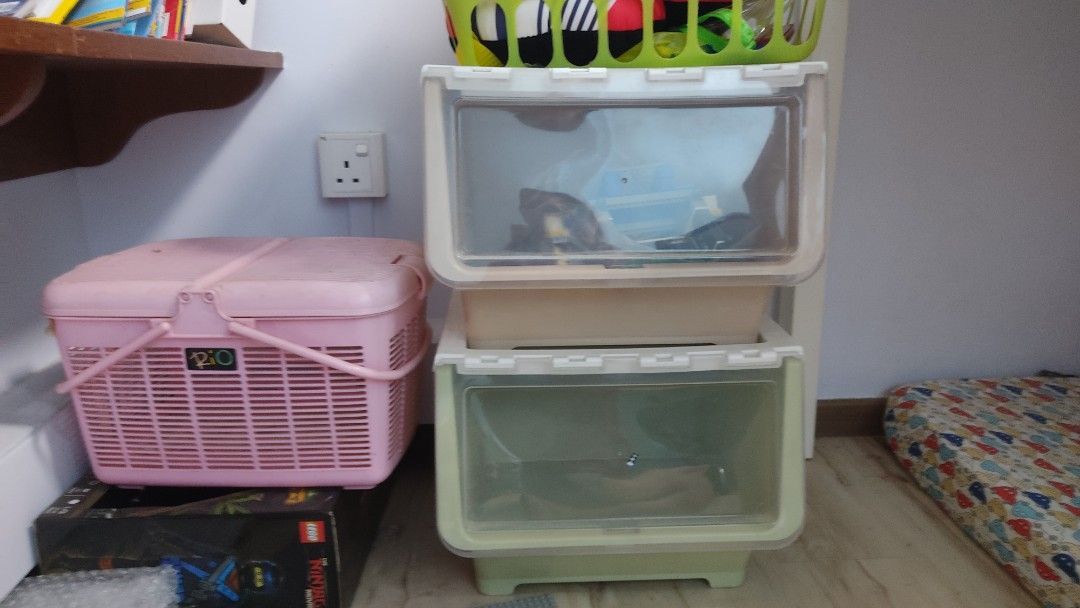 Container boxes (Category: Shelves, Cabinets & Racks) located in Singapore. Submitted by snumer.040813 (Listing ID 1200983059, Image 2). Description: Selling 2 storage containers can stack up as shown. Free pink basket . pick up @650110. Bukit Batok MRT can be considered too. Thanks.