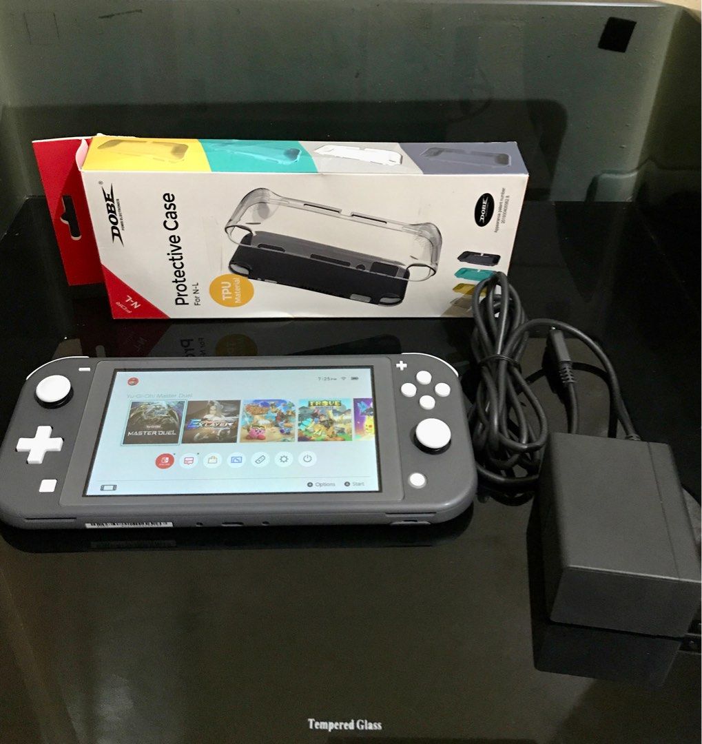 Nintendo switch lite with games, Video Gaming, Video Game Consoles ...