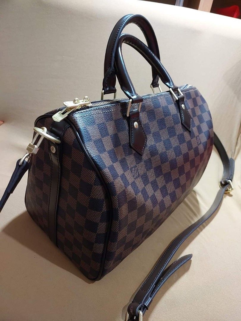 Preloved lv damier 30cm (Category: Luxury Bags & Wallets) located in Cebu City. Submitted by day.98 (Listing ID 1200867685, Image 2). Description: from japan surplus genuine leather coded two- way bag with dust bag.