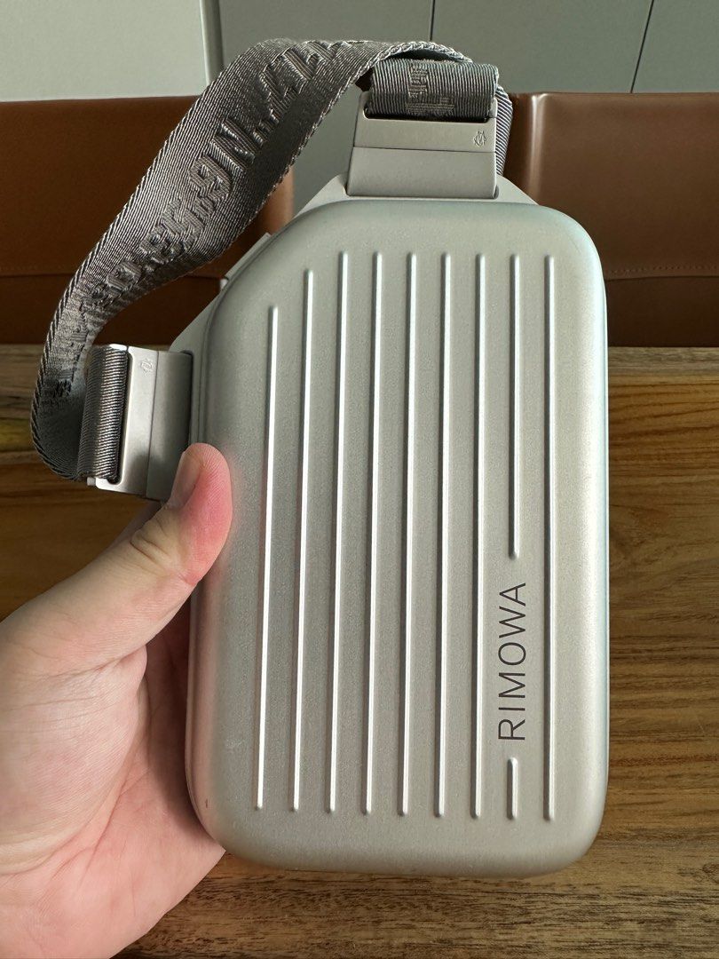 Rimowa Aluminum Sling Clutch, Luxury, Bags & Wallets on Carousell