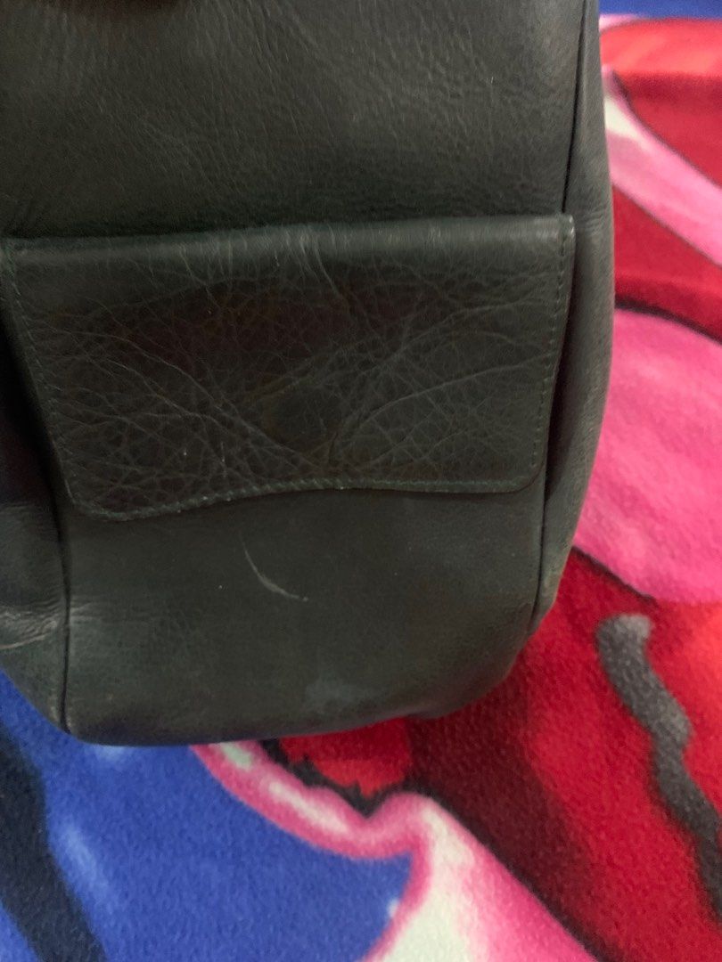The Tannery leather bag (Category: Luxury Bags & Wallets) located in Marikina City. Submitted by silvader (Listing ID 1200795015, Image 2). Description: Bought for almost 9k Has some scratches but no deep ones. Real leather! Tassle came of but can easily be attached.