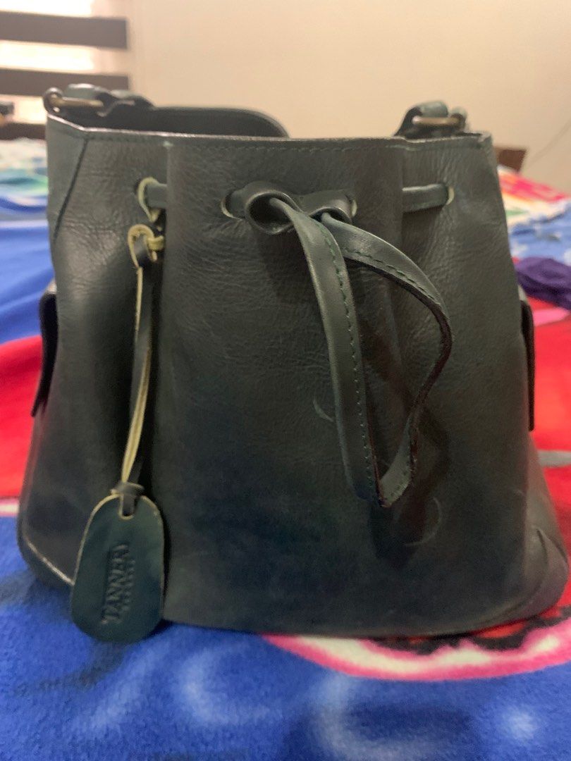 The Tannery leather bag (Category: Luxury Bags & Wallets) located in Marikina City. Submitted by silvader (Listing ID 1200795015, Image 1). Description: Bought for almost 9k Has some scratches but no deep ones. Real leather! Tassle came of but can easily be attached.