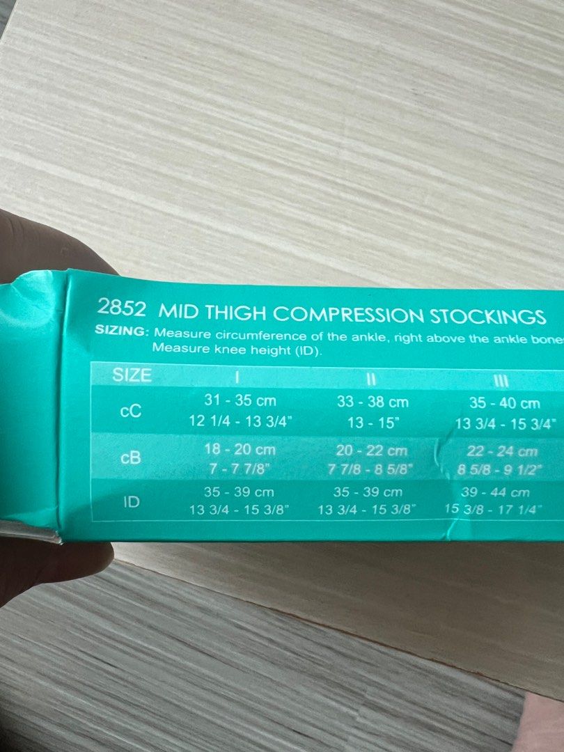 Compression socks (Category: Foot Care) located in Singapore. Submitted by buzytmum (Listing ID 1201108978, Image 4). Description: Bought the wrong size. This is size II . Brand new. Bought from shoppe for $58 .