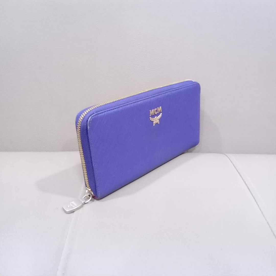 MCM Long Zipper Wallet (Category: Luxury Bags & Wallets) located in Taguig. Submitted by esa.agustin (Listing ID 1201148572, Image 2). Description: Original MCM purple saffiano leather long zipper wallet. Made in Korea..
