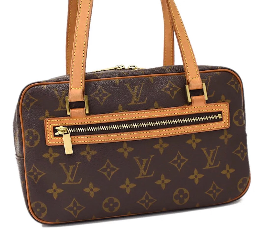 Cite cloth handbag Louis Vuitton Brown in Cloth - 17757085