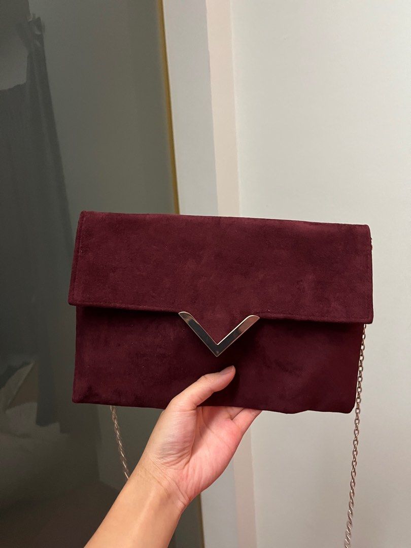 Burgundy clutch crossbody bag from New Look