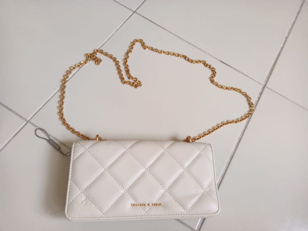 White clutch bag with chain clearance