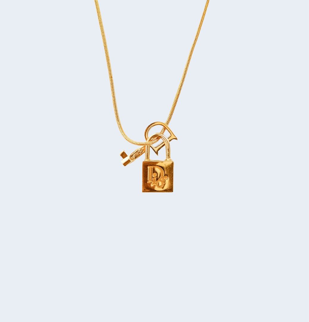 Gold dior deals lock necklace