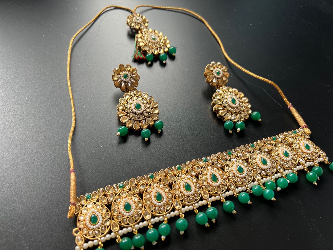Gold jewellery with stones top