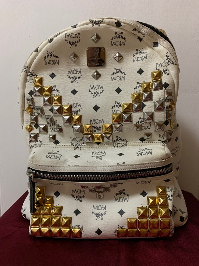 White and gold hot sale mcm backpack