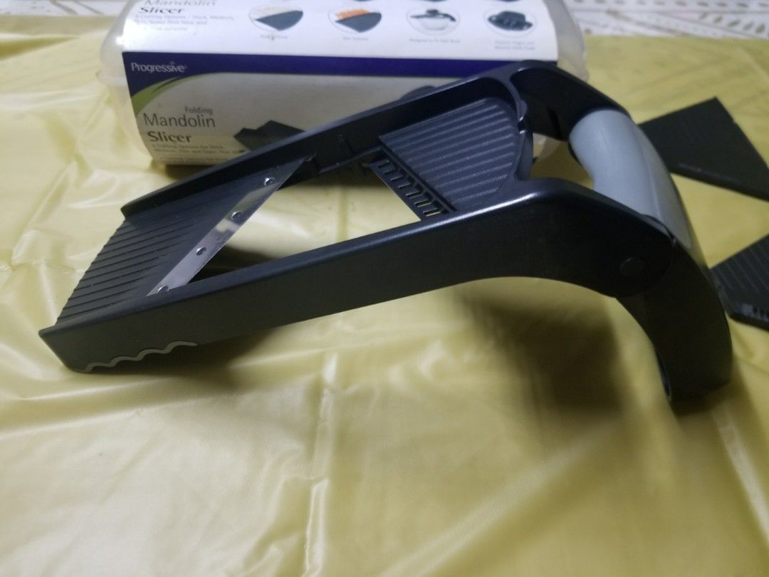 Progressive folding mandoline slicer (Category: Other Kitchenware & Tableware) located in Quezon City. Submitted by redfullmoon (Listing ID 1201298938, Image 3). Description: Progressive brand folding mandoline slicer, used a few times then kept in storage. Very good condition, just some scratches on finger guard. Original price is 1k+, currently retails for PHP 1,450 on Lazada. RFS: decluttering - Multi slicer offers 4 different cutting blades f