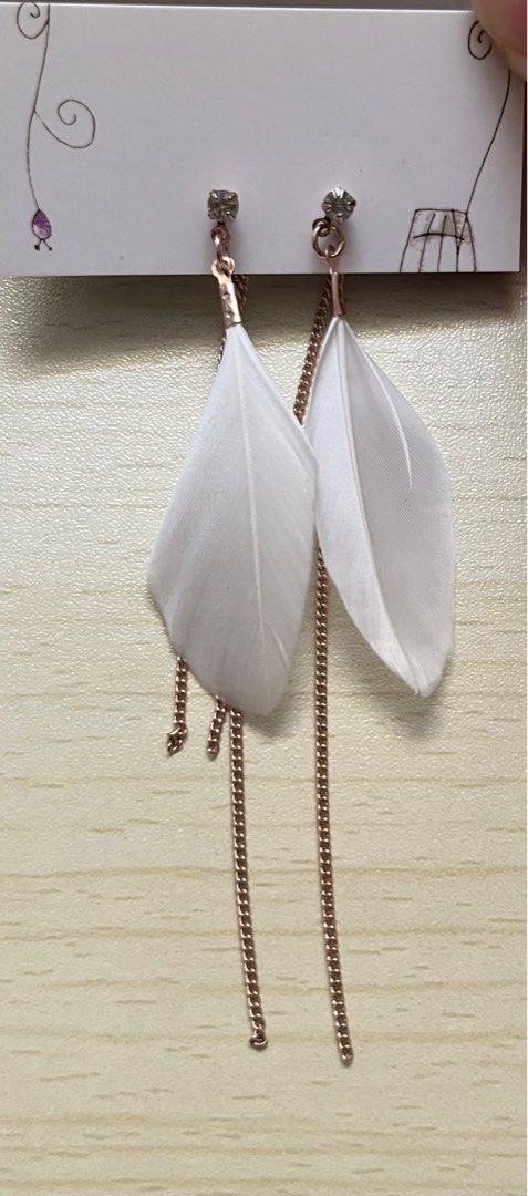 White feather earrings outlet