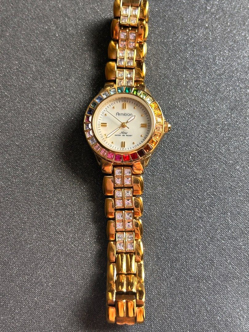 Armitron gold watch with diamonds deals