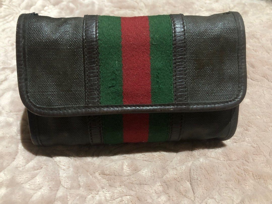 Bundle Authentic Vintage Gucci Web Hip Bag and Bifold Long Wallet (Category: Luxury Bags & Wallets) located in Rosario. Submitted by myvinatgepieces (Listing ID 1201560730, Image 2). Description: Vintage Pieces! Guaranteed Authentic This is an authentic GUCCI Monogram Web Belt Bag in Dark Brown. The stylish belt bag features brown leather trim, a red and green webbed stripe and an adjustable brown leather belt. The flap opens to a brown fabric in