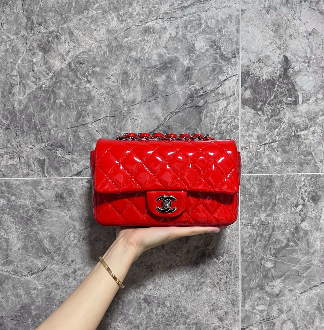 18C Chanel Timeless Mini Rectangular Classic Flap Red Caviar SHW $5595 USD  Condition: Excellent Condition with wear on the edges of the…