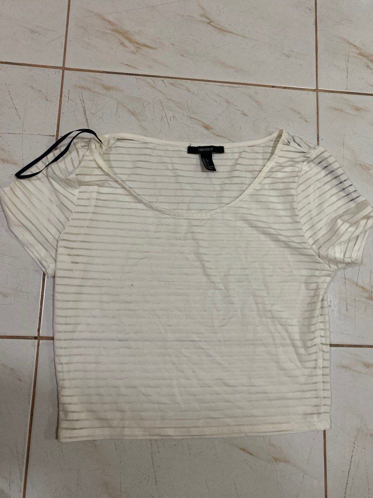 Forever 21 Crop Top (Category: Blouses) located in Manila. Submitted by sunstarshop (Listing ID 1201543422, Image 1). Description: forever 21 size large small stain (unnoticable).