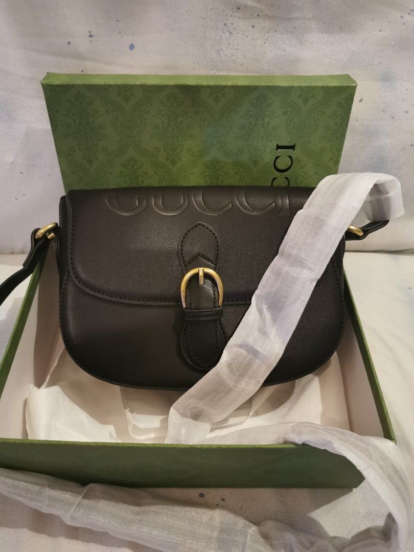 Gucci embossed crossbody deals