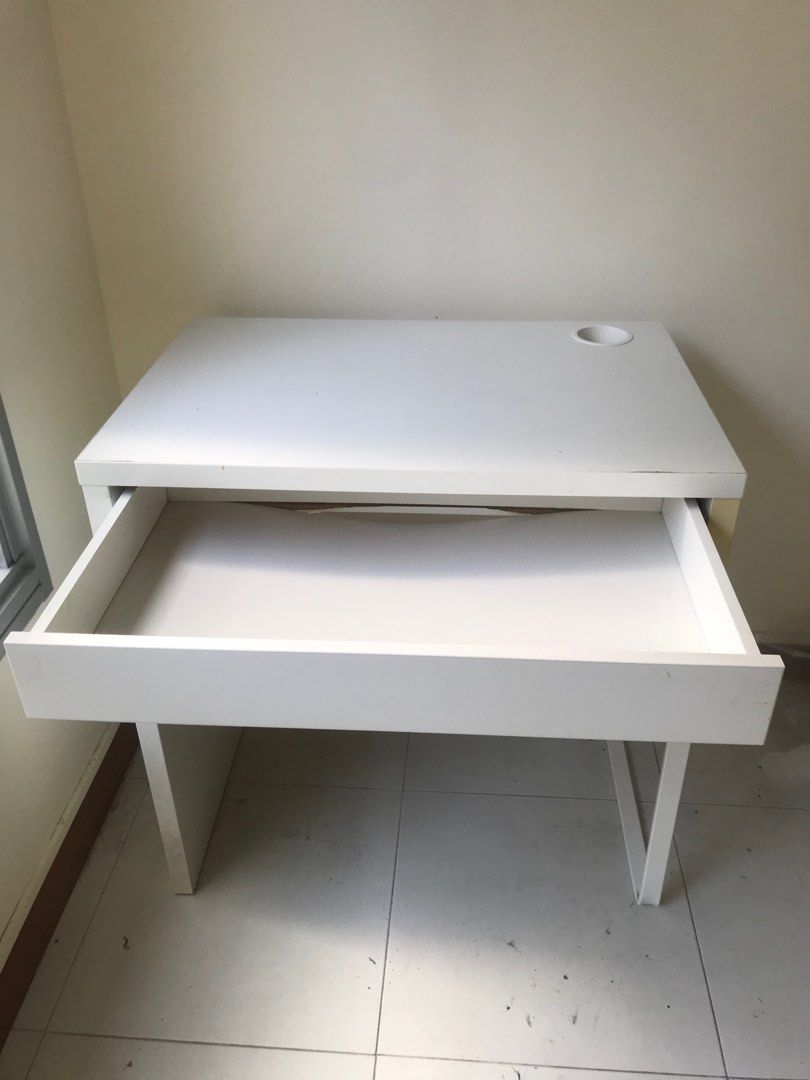 IKEA computer table (Category: Tables & Sets) located in Singapore. Submitted by rndqqsj9yn (Listing ID 1201537046, Image 2). Description: Moving house collect today till Dec 11 Drawer board slight damage .