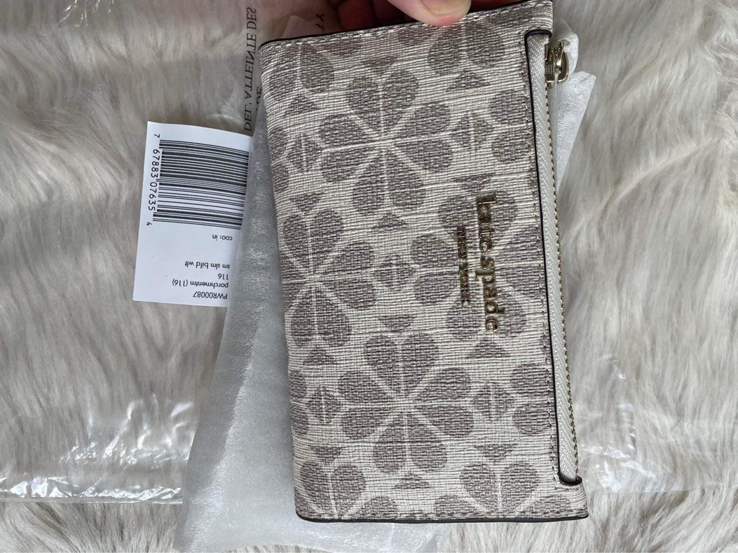 Kate Spade Flower Coated Canvas Small Slim Bifold Wallet Parchment
