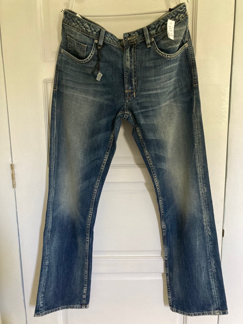 Men jean wider slim fit, Men's Fashion, Bottoms, Jeans on Carousell