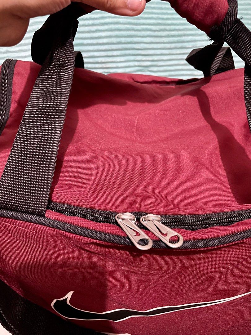 NIKE Large Red duffle bag, Men's Fashion, Bags, Sling Bags on Carousell
