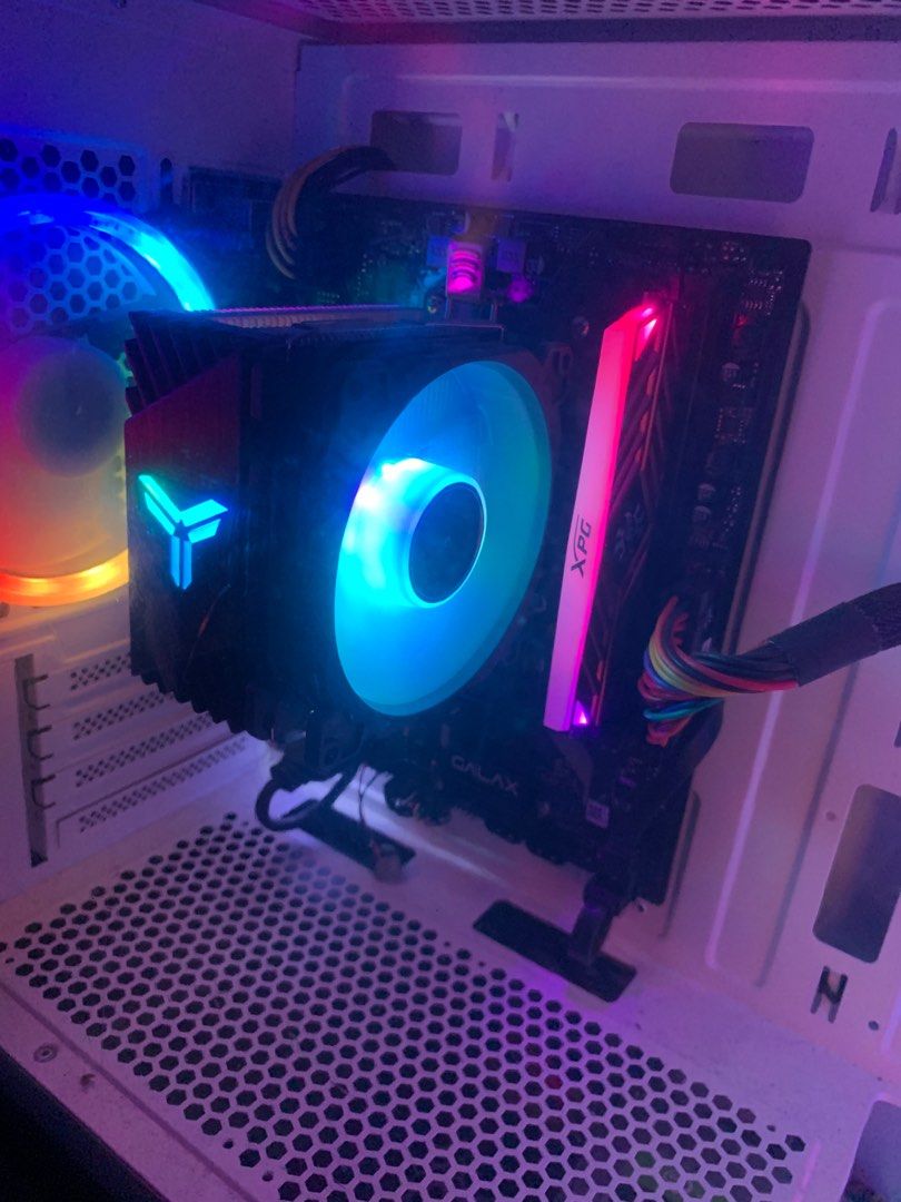 PC (Category: Desktops) located in Ampang. Submitted by punkjunk (Listing ID 1201438805, Image 3). Description: SPECS CPU : AMD Ryzen 5 3400G GPU : Radeon Vega 11 Graphics MOBO : GALAX A320M RAM : XPG Spectrix D41 RGB 8GB 2666MHz DDR4 SSD : PNY CS900 120GB HDD : Seagate 500GB PSU : Gigabyte 600W 80+ CASE : Segotep Gank 5 x 4 RGB Fan CPU Cooler : Jonsbo CR-1200 RGB FREE : * AULA Mountain T200 Gaming Keyboard Colorful Backlight & Multi-function Kno