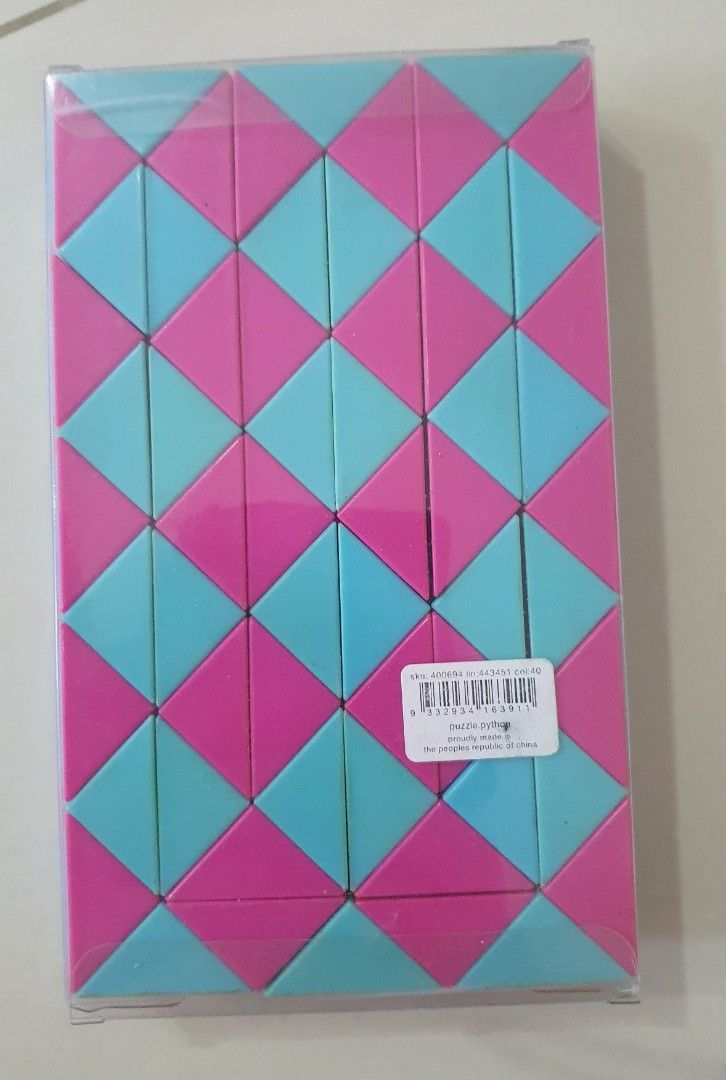 Smiggle Python Puzzle (Category: Toys & Collectibles) located in Singapore. Submitted by yenyen.yy (Listing ID 1201541246, Image 2). Description: pre-loved smiggle snake puzzle..