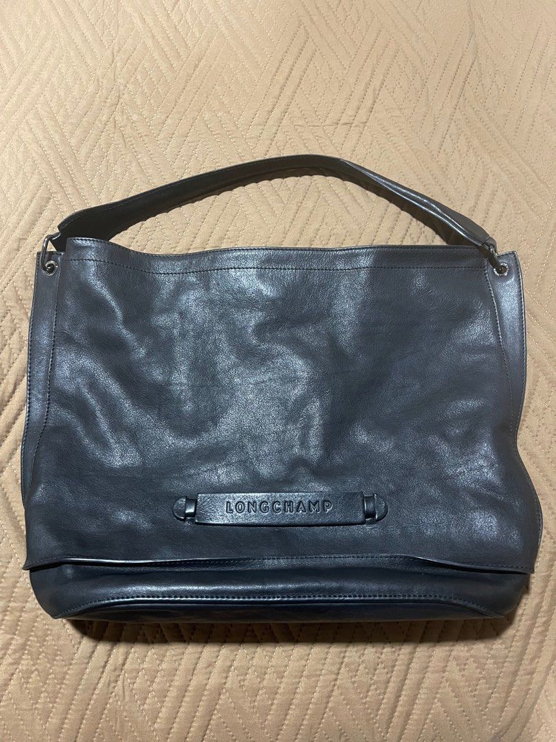 100% Authentic Longchamp Bag (Category: Luxury Bags & Wallets) located in Cebu City. Submitted by chatty124 (Listing ID 1201651808, Image 1). Description: RFS: Decluttering Dimensions H: 12 inches W: 16 inches D: 5 inches.
