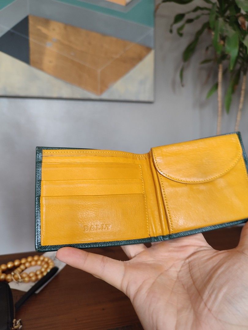 Bally saffiano leather deep green bifold wallet (Category: Wallets & Card Holders) located in Mandaluyong City. Submitted by ice.declutter (Listing ID 1201683951, Image 3). Description: Bally deep green saffiano leather bifold wallet for sale slightly used condition selling low pm me for any concerns :).