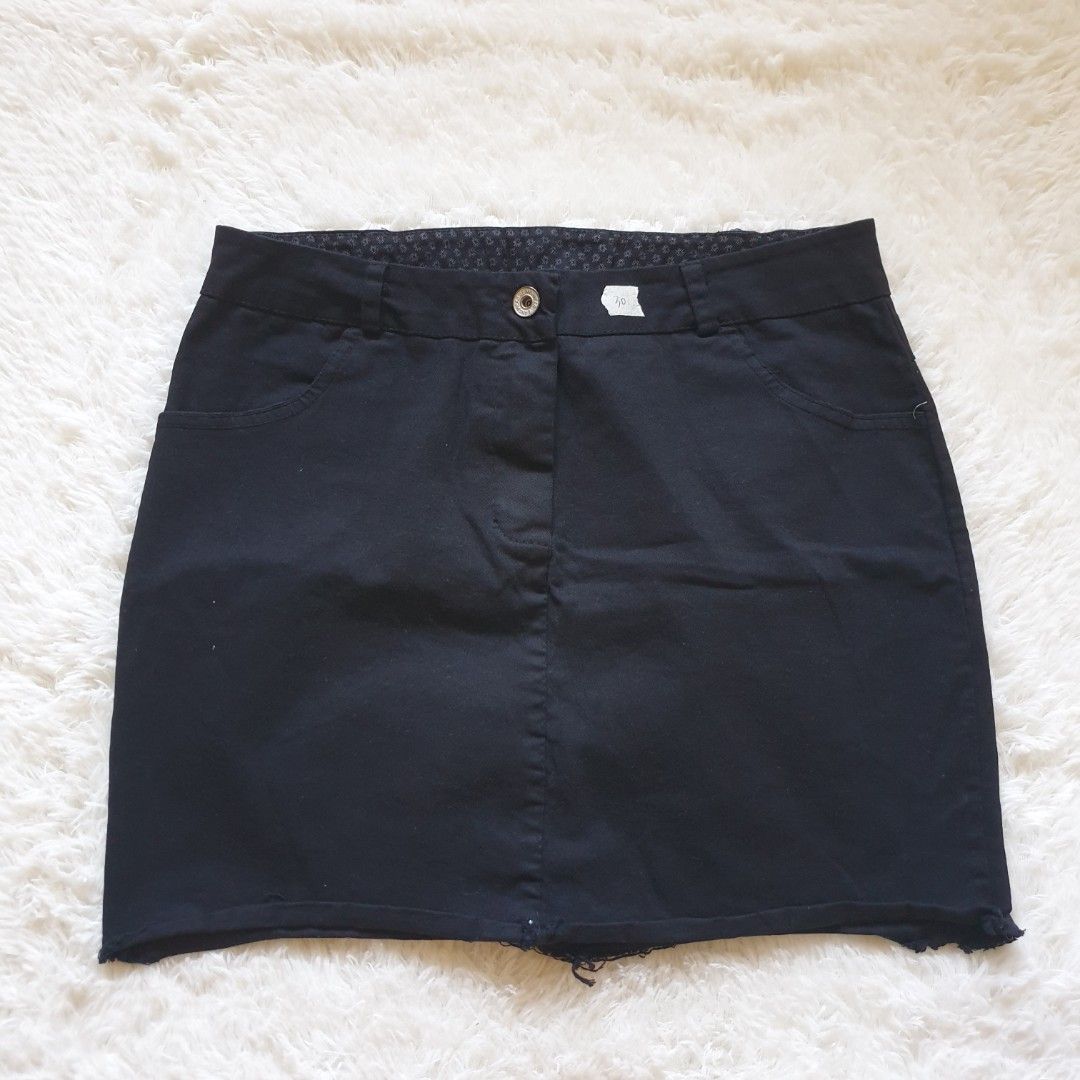 Black Denim Skirt Solid Black (Category: Skirts) located in Angat. Submitted by phase2shop (Listing ID 1201681557, Image 1). Description: Size 30 no flaws.