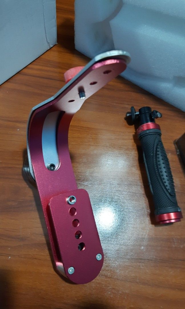 Mini Handheld Steadycam Camera Stabilizer Handle Grip (Category: Gimbals & Stabilizers ) located in Baliuag. Submitted by mostlyaboutnintendo (Listing ID 1201811787, Image 3). Description: The Steady Video Stabilizer is designed for use with camcorders, DSLRs, HD DSLRs, etc. It provides excellent stability and reduces camera vibration during video recording, assuring high-quality, and clear videos. Its aluminum alloy construction provides and sol