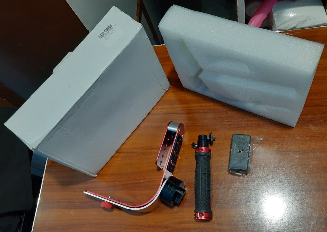 Mini Handheld Steadycam Camera Stabilizer Handle Grip (Category: Gimbals & Stabilizers ) located in Baliuag. Submitted by mostlyaboutnintendo (Listing ID 1201811787, Image 1). Description: The Steady Video Stabilizer is designed for use with camcorders, DSLRs, HD DSLRs, etc. It provides excellent stability and reduces camera vibration during video recording, assuring high-quality, and clear videos. Its aluminum alloy construction provides and sol