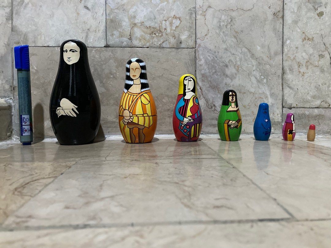 Mona Lisa Nesting Babushka Dolls (Category: Other Home Decor) located in Quezon City. Submitted by jennybug (Listing ID 1201717179, Image 1). Description: Mona Lisa nesting babushka dolls Total 7 dolls Made of wood Made by Pylones Stored only Price still negotiable GCash, COD, Maya.