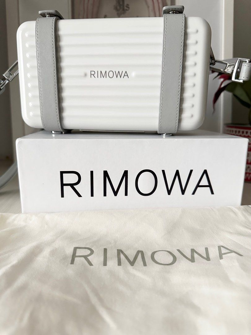 Rimowa crossbody deals clutch bag