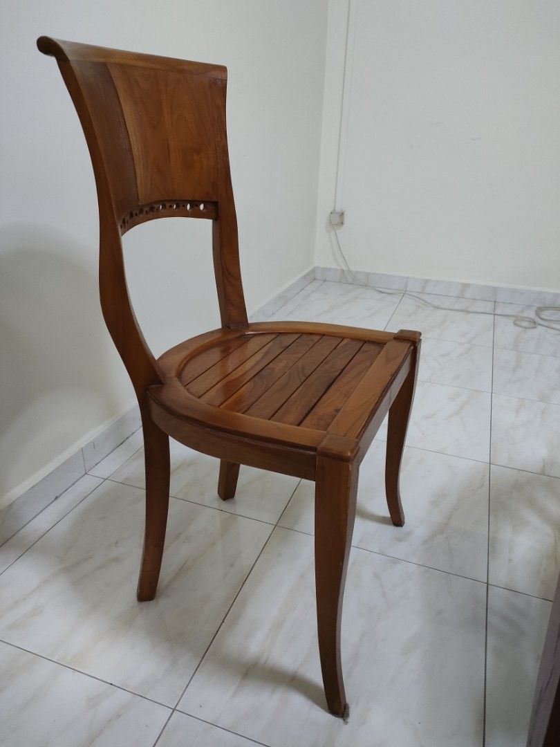 Solid wood dining table set (Category: Tables & Sets) located in Singapore. Submitted by chuasc4000 (Listing ID 1201769754, Image 3). Description: set of 4 chairs and 1 table dimensions: 1.6m length, 1m width, 77cm height.