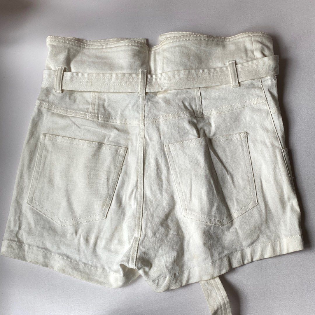 white shorts with belt buckle