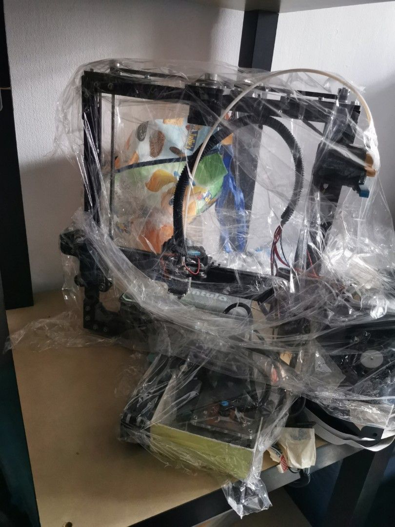3D printer (Category: Printers, Scanners & Copiers) located in Singapore. Submitted by callmeyellowup (Listing ID 1201932502, Image 1). Description: Doesn't work. Not sure why, has a new motherboard tho. Will include all accessories needed, including power supply, spare bits and bobs. Last owner fixed this to a mobile furniture sort of thing. Only PSU is fixed the printer is mobile. PM to find out more....