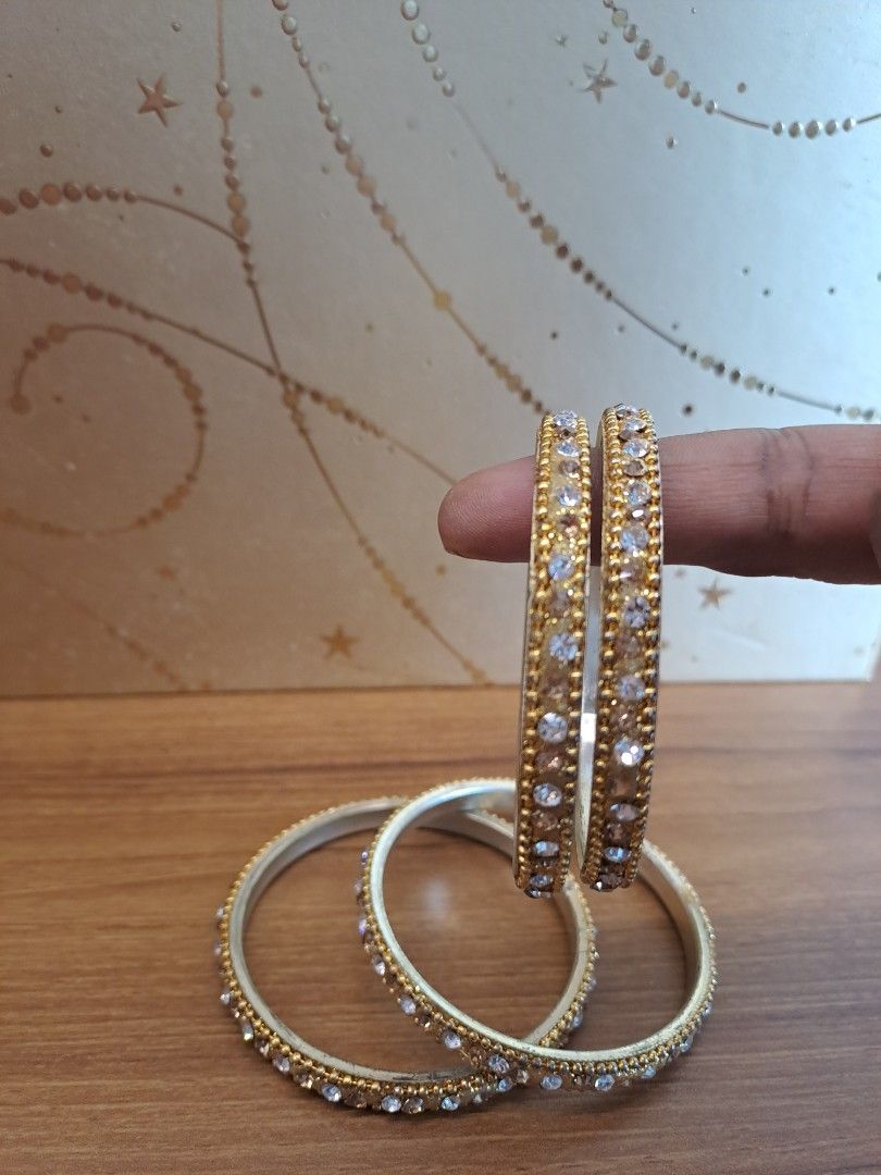 Gold bangles set of 4 hot sale