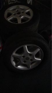 Mags & tires set, used 4-holes, 14in mags with 185/65R14 tires..