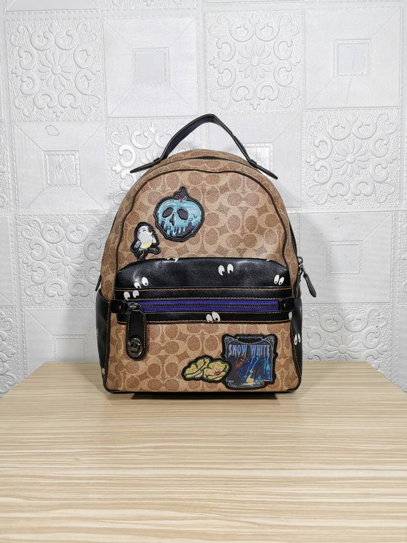 Snow white coach discount backpack