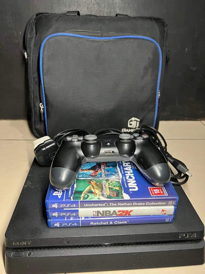 PS4 (Category: PlayStation) located in Bacoor. Submitted by ash.vermis15 (Listing ID 1201921040, Image 3). Description: FOR SALE ❗❗❗ PS4 Slim 1TB Latest firmware Inclusions: 📌 1 DualShock Wireless Controller 📌 HDMI Cord 📌 USB cord for charging controller 📌 with Bag Games: 📌 NBA 2K21 📌 Ratchet & Clank 📌 Uncharted Collection (1,2,3) Condition: 10/10, Good as New ✉️ DM me if interested.